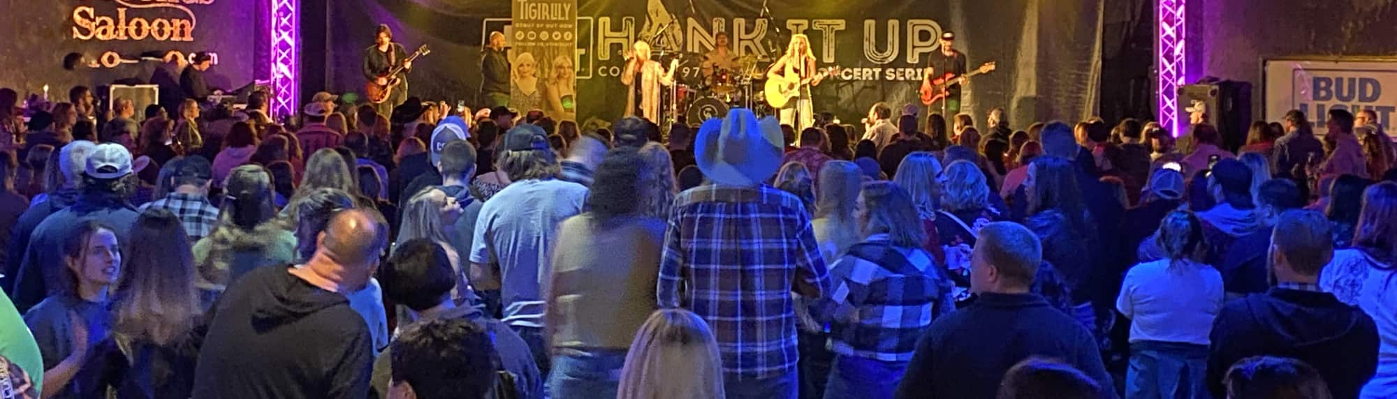 country concert with fans wearing cowboy hats Kansas City
