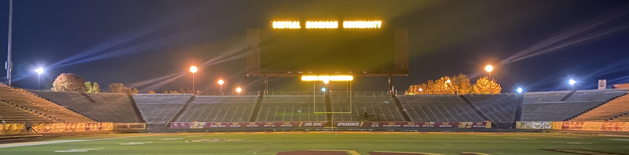 empty football stadium at night under the lights Kansas City